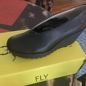 Fly London, brand new, never worn. Runs big. Size 8-8.5